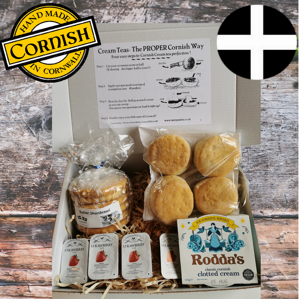 cornish-cream-tea-with-shortbread--baked-by-tasty-pasties-and-bude-round-cornish-flagamd wood-background-1.